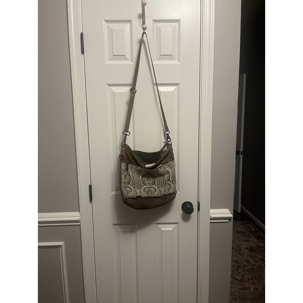 Sling Myra Brandish over your shoulder purse. Crossbody
